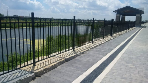 ACO K200 channel drain in a waterfront paver promenade
