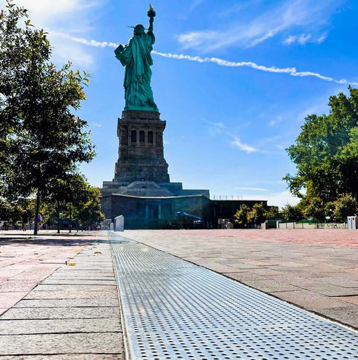 ACO K300 trench drain in a waterfront plaza near the Statue of Liberty
