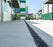 ACO PowerDrain S100K channel drain outside a commercial building
