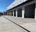 ACO PowerDrain S200K trench drain in a commercial warehouse driveway
