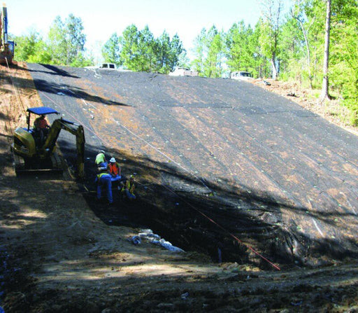 Enkamat R45 erosion control mat installation on an embankment with toe drain
