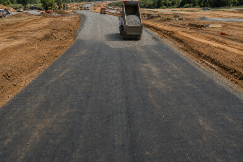 Geotextile fabric under gravel on a new subdivision road
