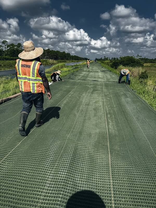 Pyramat high performance turf reinforcement mat installed along a drainage channel
