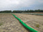 Silt sock installed for perimeter control alongside a pipeline construction corridor
